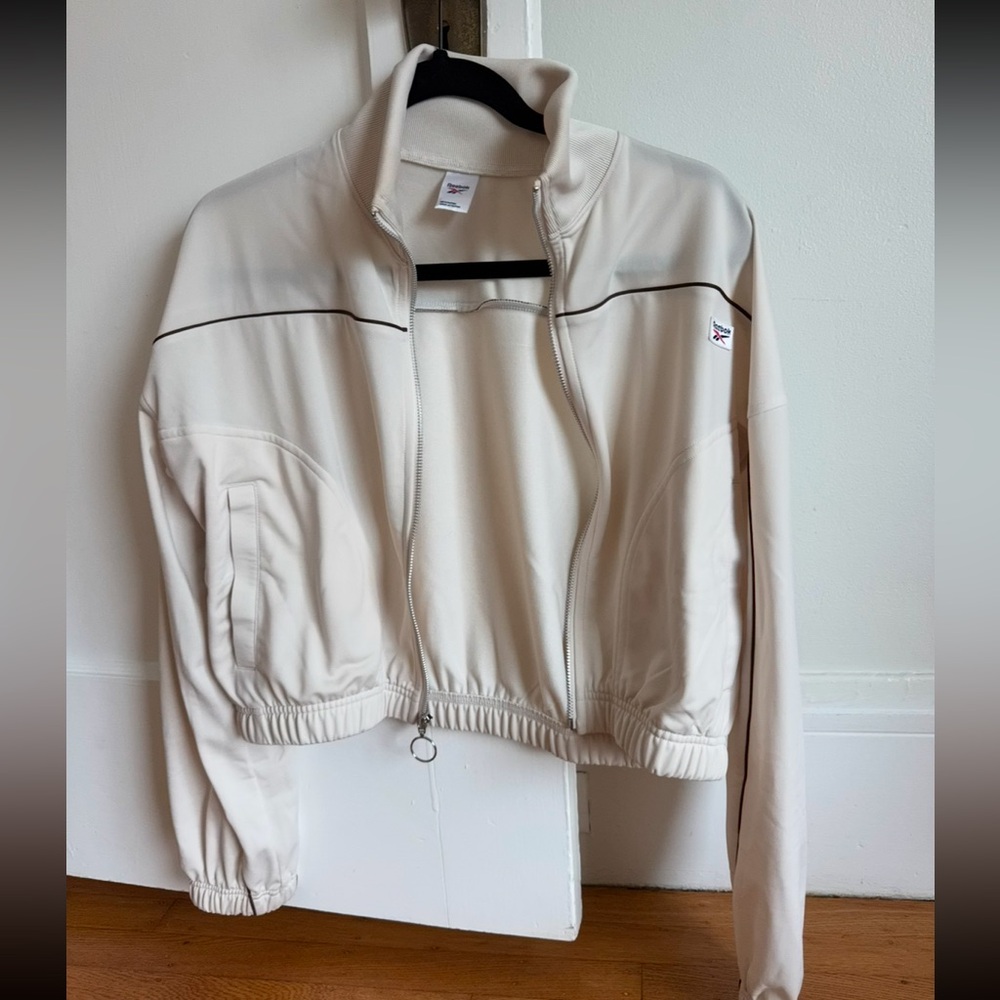 Women’s classic Reebok tracksuit jacket in off white color